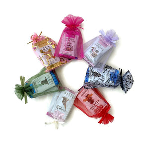 Chuao chocolates in a variety of colored organza bags.